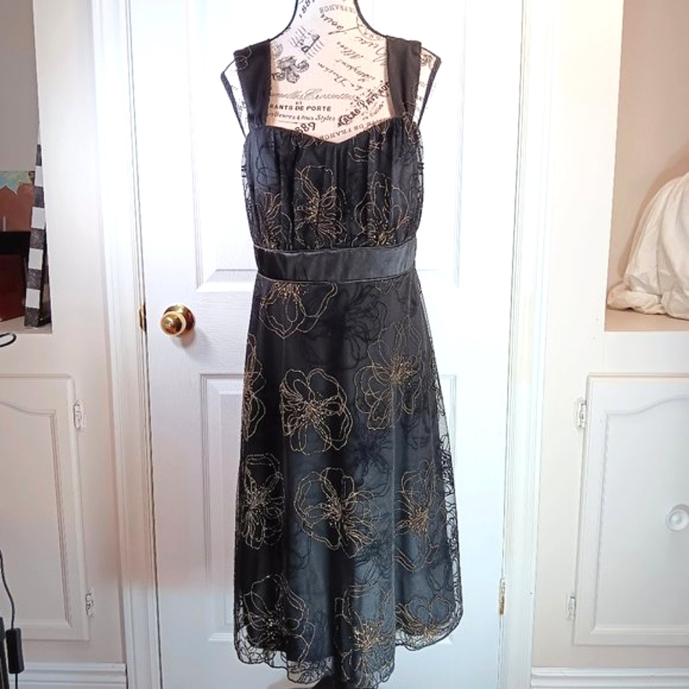 Chic Black Dress with Gold Floral Accents